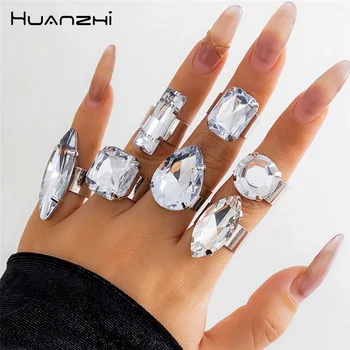 Комплект пръстени с имитация на кристал HUANZHI от акрил от 7 теми за жени и момичета, геометрични лъскави модни леки луксозни бижута, подаръци, Нестандартен 2024 г.